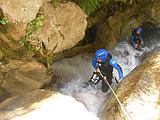 Abseiling into a gorge